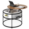 Round lift top coffee table in teak with hidden compartment and side shelves, perfect for organizing small items.