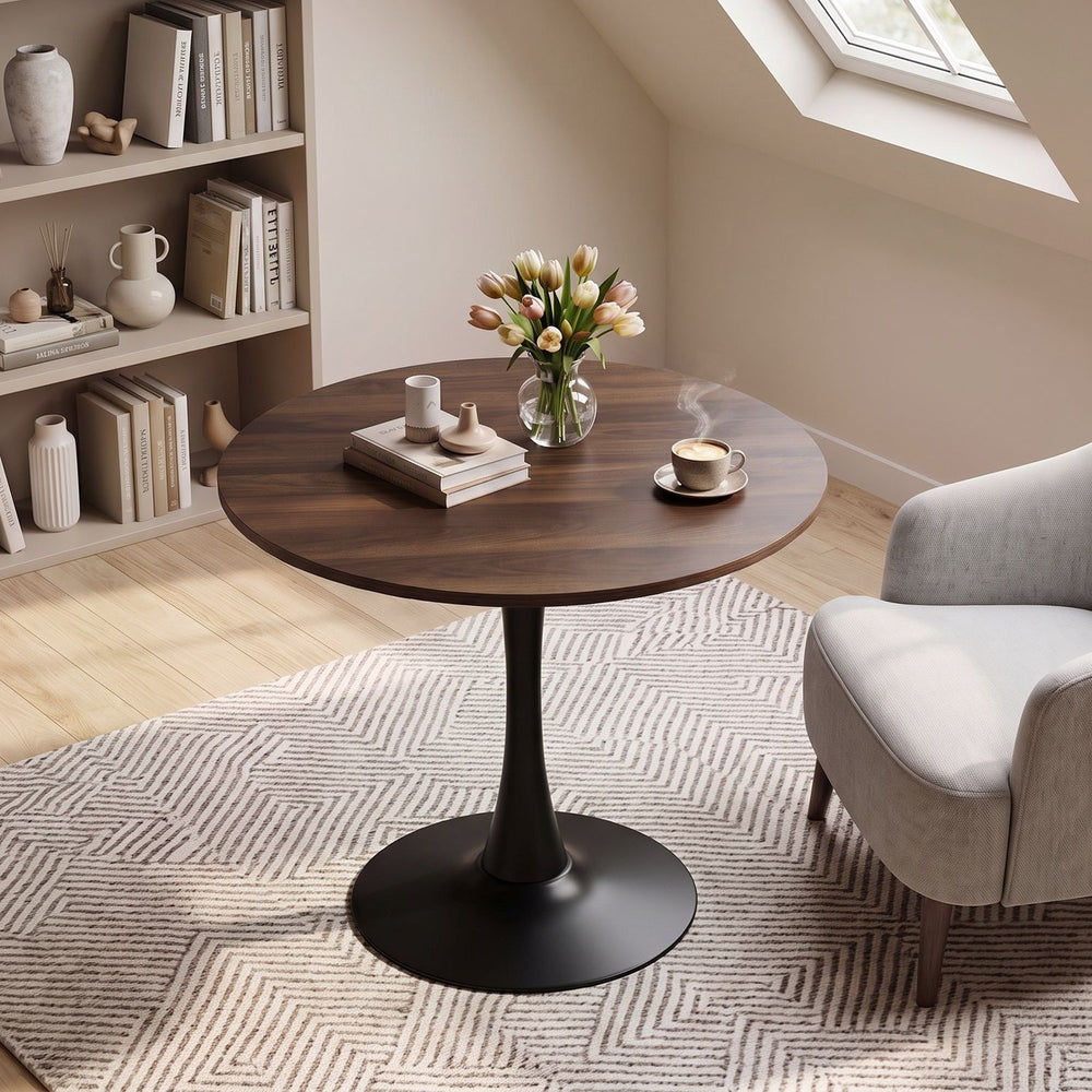Round 31.5-inch walnut tulip table with metal pedestal, perfect for small spaces and stylish dining setups.