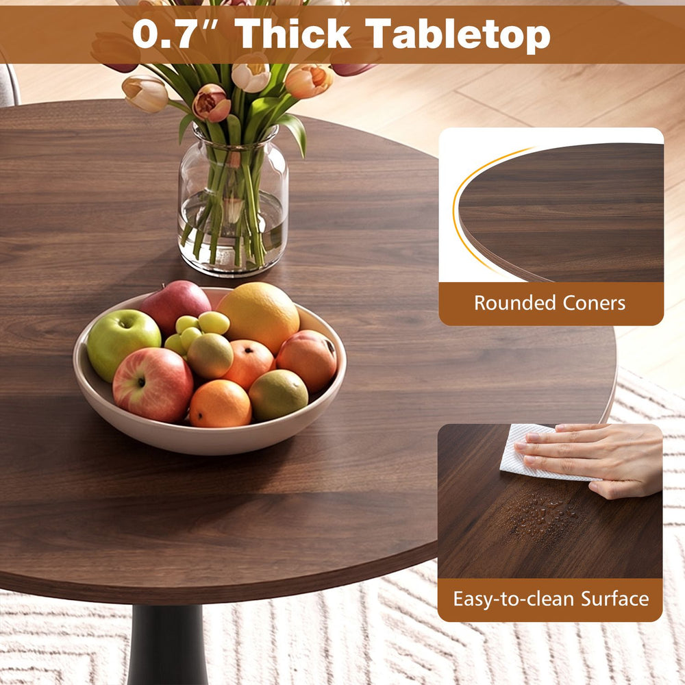 Round 31.5-inch walnut tulip table features a thickened surface and easy-to-clean design, perfect for small spaces.