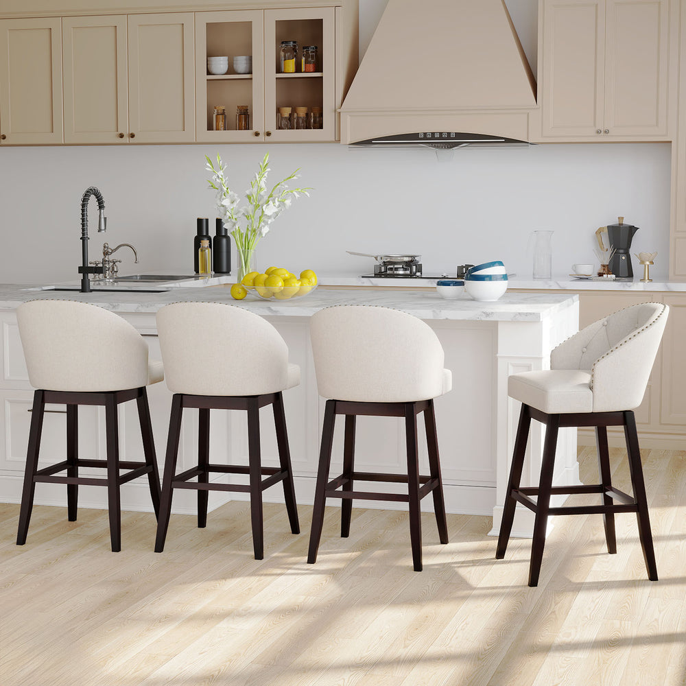 Set of 4 beige padded bar stools with rubber wood frame and swivel seats, perfect for kitchen islands or cafes.