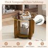 Round coffee table with a 0.31" thick tempered glass top and walnut finish, featuring a storage shelf and wheels for.