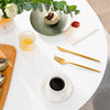 Modern tulip round dining table with a white MDF top, perfect for small spaces and accommodating up to 4 people.