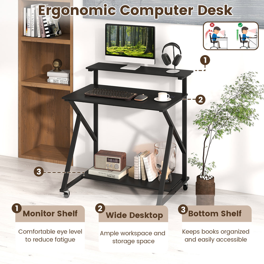 Rolling computer desk with ergonomic monitor shelf, black finish, and built-in power outlets for small spaces.