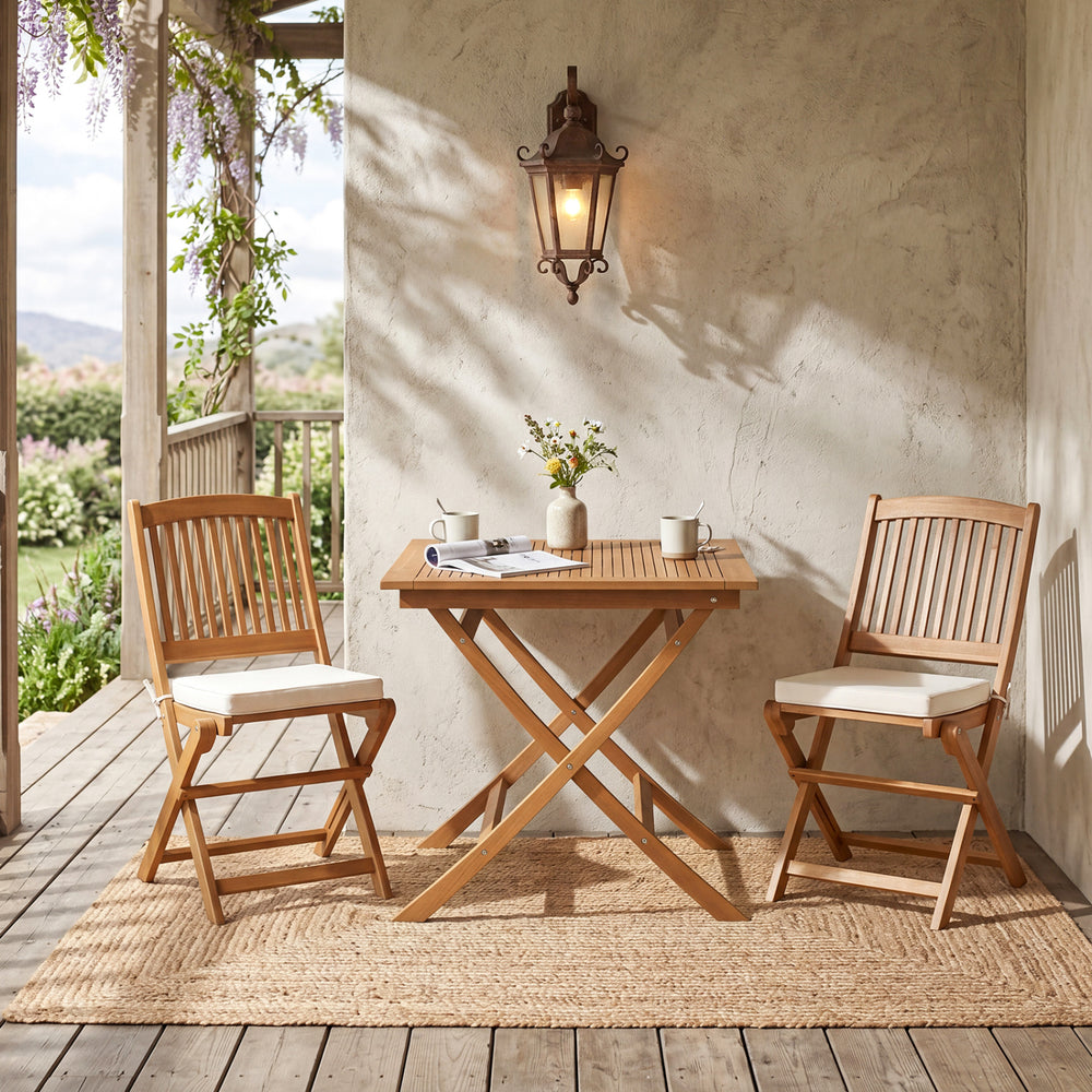 32-inch square solid teak wood patio dining table with two folding chairs, perfect for intimate dining on the porch.