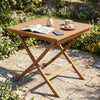 32-inch square solid teak wood patio dining table with X-brace frame, perfect for intimate dining in outdoor settings.