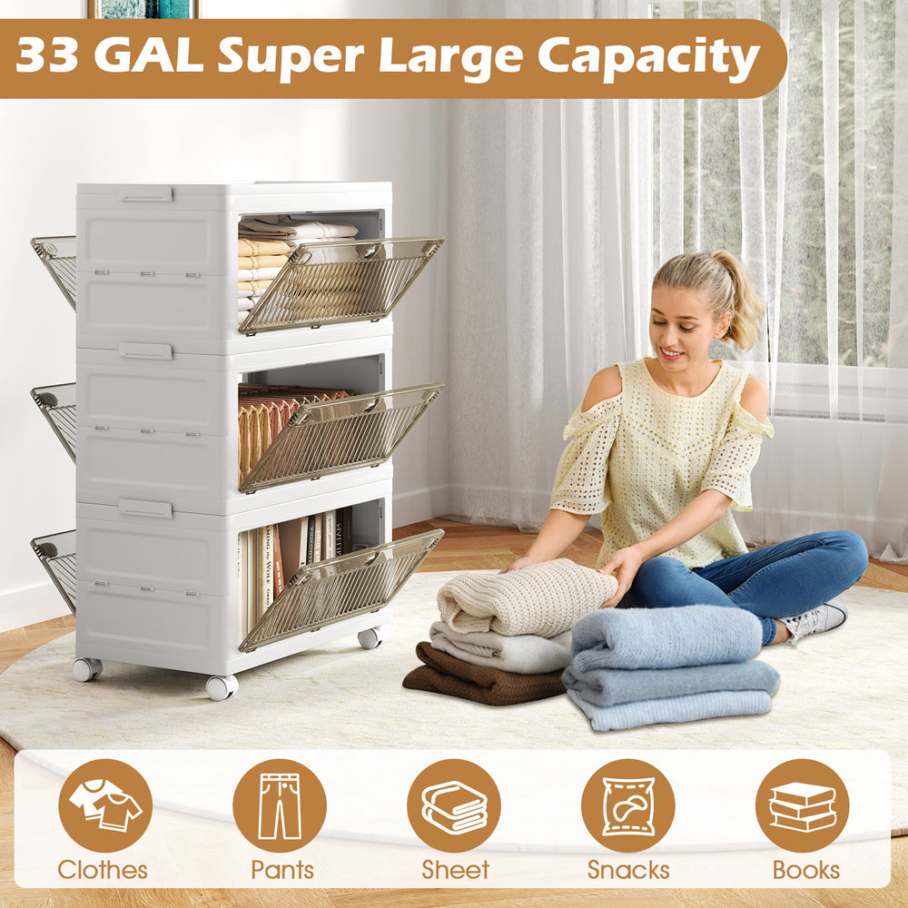 Stackable 33-gal plastic storage bins in white with translucent doors, ideal for organizing clothes and blankets.