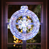 33-inch lighted snowflake wreath with 128 LED lights, perfect for indoor and outdoor Christmas decoration.