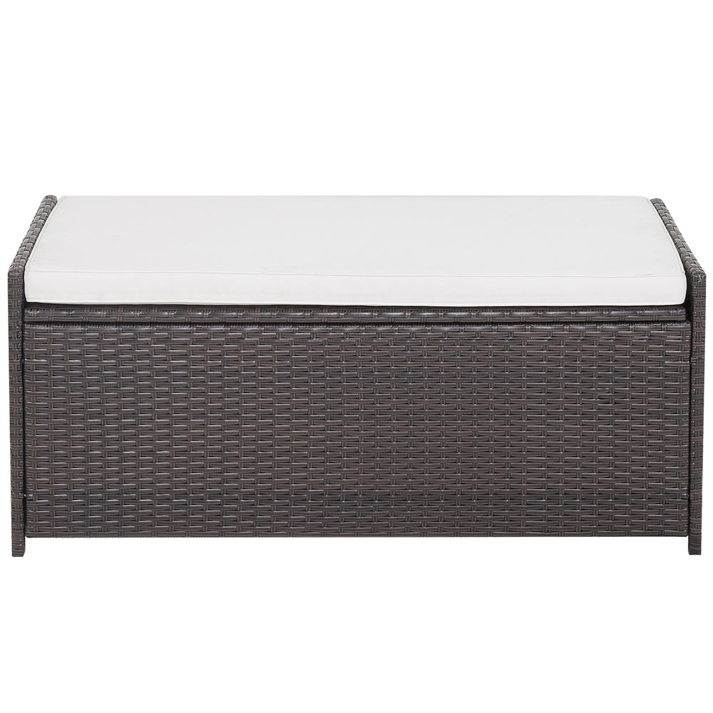 Patio storage bench with a soft cushion, made of durable brown PE rattan, perfect for outdoor seating and storage.