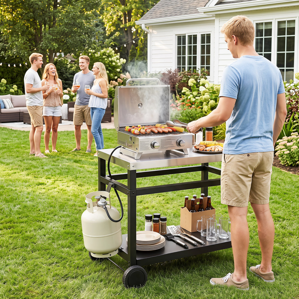 Double-shelf grill table with a stainless steel top, ideal for outdoor cooking and easy maintenance during gatherings.
