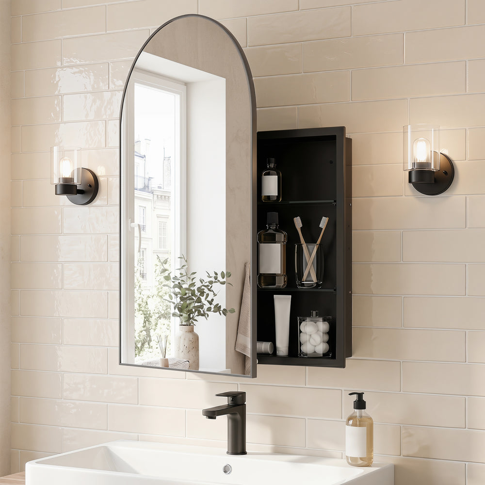 Wall-mounted black storage cabinet with arched mirror and adjustable shelves, perfect for elegant bathroom organization.