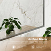 Brushed metal wall-mounted cabinet features an arched mirror and adjustable shelves for stylish and functional storage.