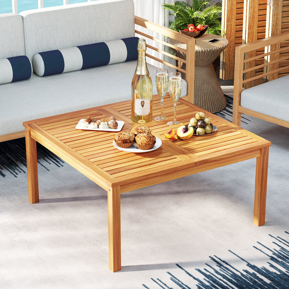 Acacia wood coffee table with slatted design, perfect for outdoor use on patios, balconies, or poolside.
