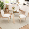 Round glass dining table with rubber wood frame, 36 inches wide, featuring two white chairs for versatile dining.