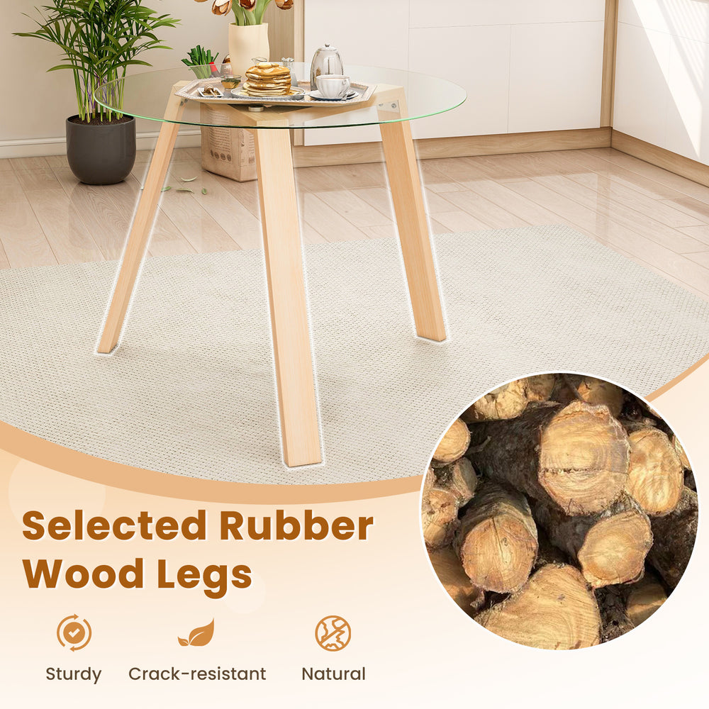 Round glass dining table with natural rubber wood legs, 36" surface, ideal for dining or living room use.