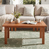Rectangular hardwood coffee table with slatted top, perfect for outdoor use in backyard settings.