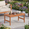 Teak-finished outdoor coffee table with a slatted design, providing a spacious surface for drinks and snacks in gardens.