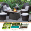 35-inch propane gas fire pit table with wicker rattan design and lava rocks, ideal for garden or patio gatherings.