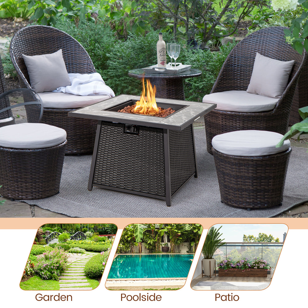 35-inch propane gas fire pit table with wicker rattan design and lava rocks, ideal for garden or patio gatherings.