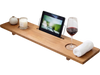 Wood bath tray with adjustable legs, cup holders, and tablet slot for enhancing your relaxation experience in the tub.