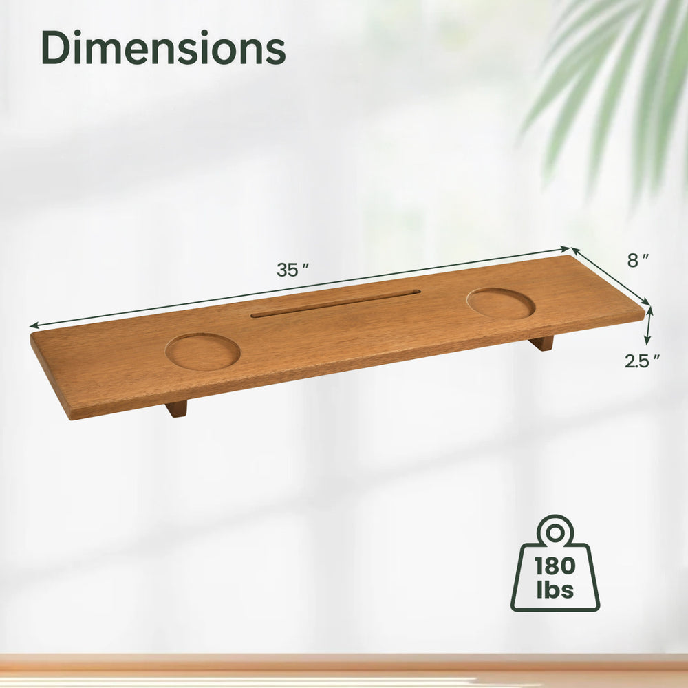 Wood bath tray measuring 35 x 8 inches with adjustable legs, cup holders, and tablet slot for enhanced relaxation.