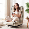 360° swivel floor gaming chair in cream PU leather, featuring a 6-position adjustable backrest for gaming and relaxing.