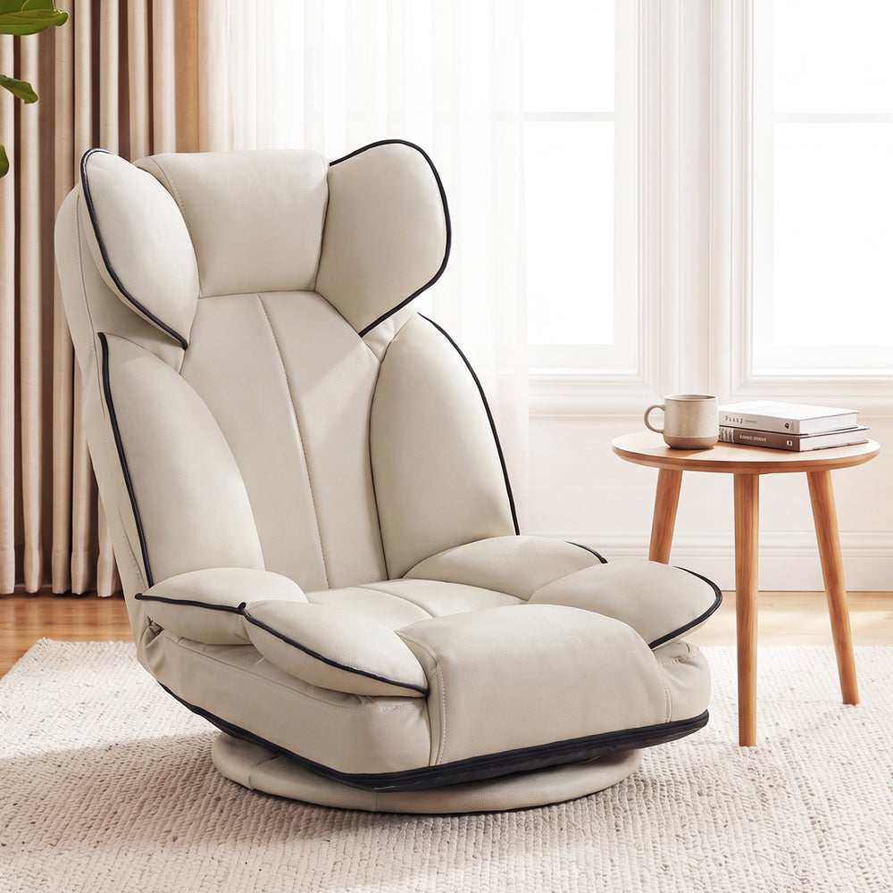 360-degree swivel floor gaming chair in cream PU leather with adjustable backrest, perfect for relaxing and gaming.