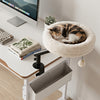 Cozy 360° rotating cat desk bed in white, designed for indoor cats, with removable perch and hanging bell toy for play.