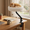 Cozy white 360° rotating cat desk bed with removable perch and hanging toy, perfect for indoor cats up to 55 lbs.