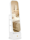 Full-length mirror jewelry cabinet in white with a swivel base, built-in lights, and drop-down makeup shelf for convenience.