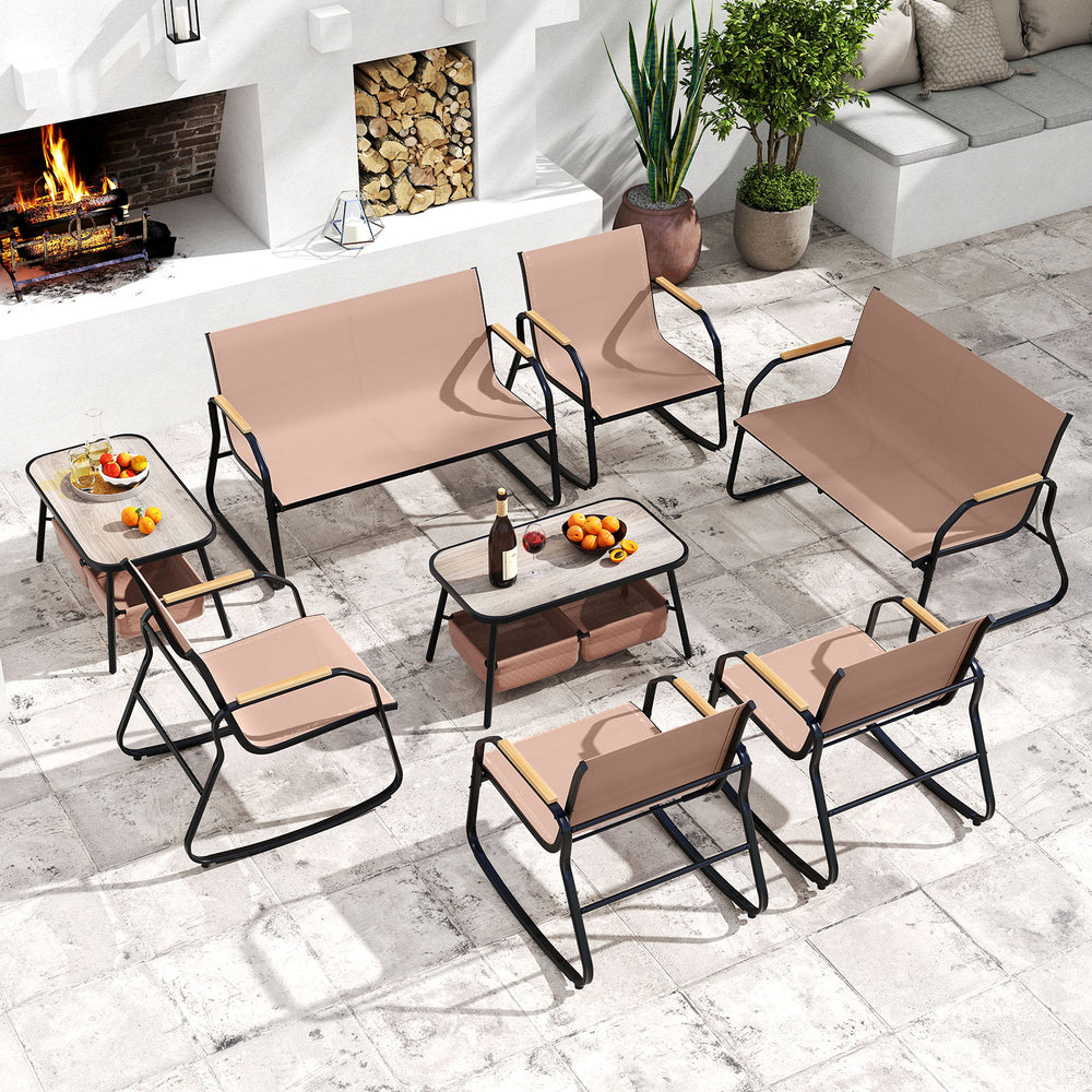 4-piece patio furniture set featuring rocking bistro chairs with breathable fabric, perfect for outdoor relaxation.