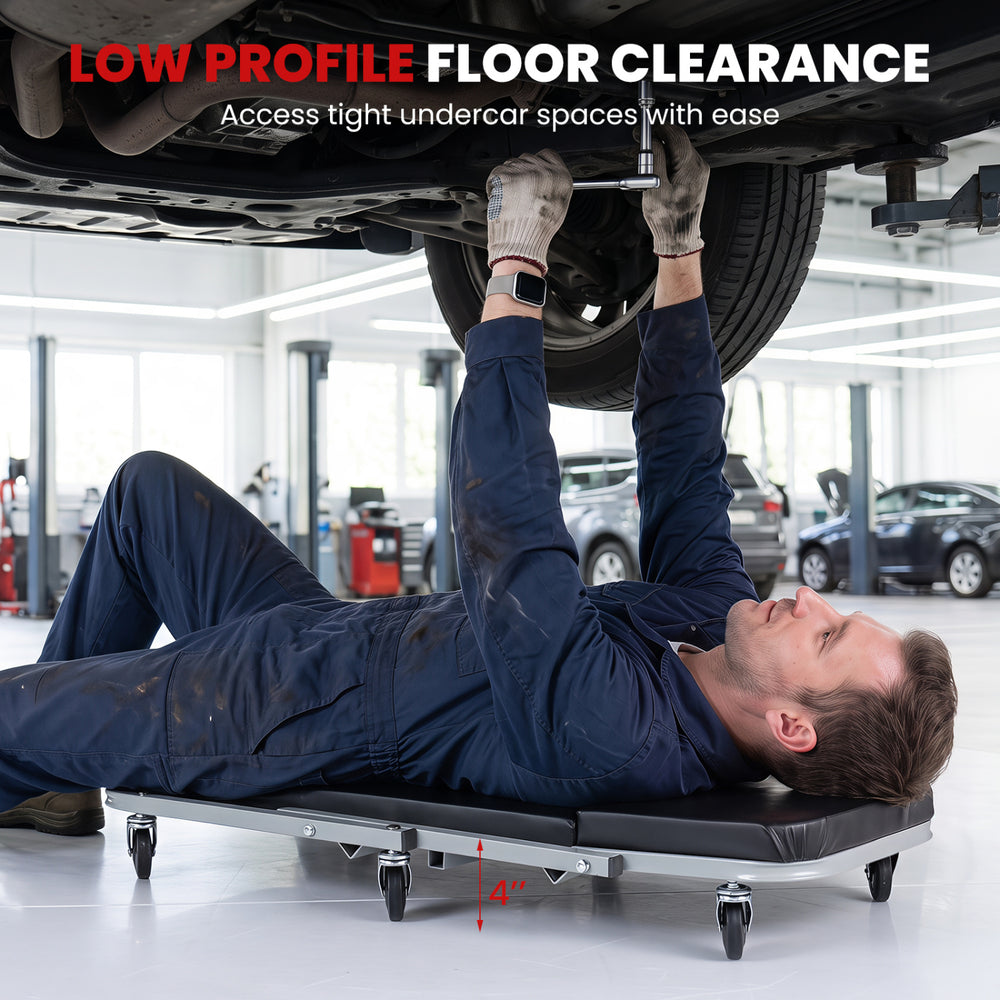 Mechanic creeper with 4" low profile floor clearance and 6 swivel casters for easy access under vehicles.