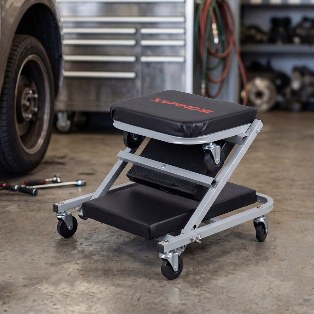 Mechanic creeper and Z-seat with 6 swivel casters, featuring waterproof padding for comfort in garage or auto repair.