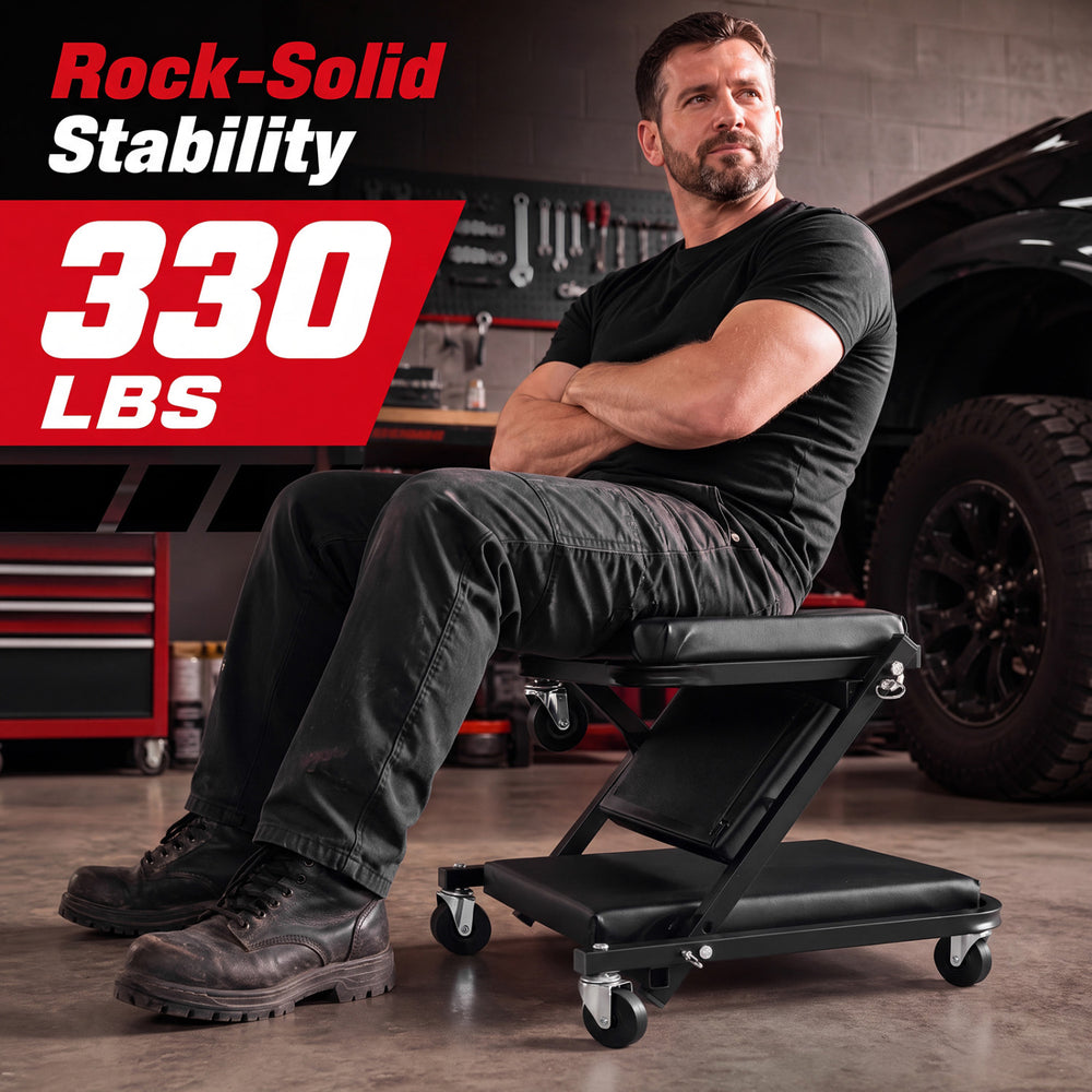 Mechanic creeper with 1.5" padded seat, 330 lbs capacity, and 6 wheels for easy mobility in garage or workshop use.