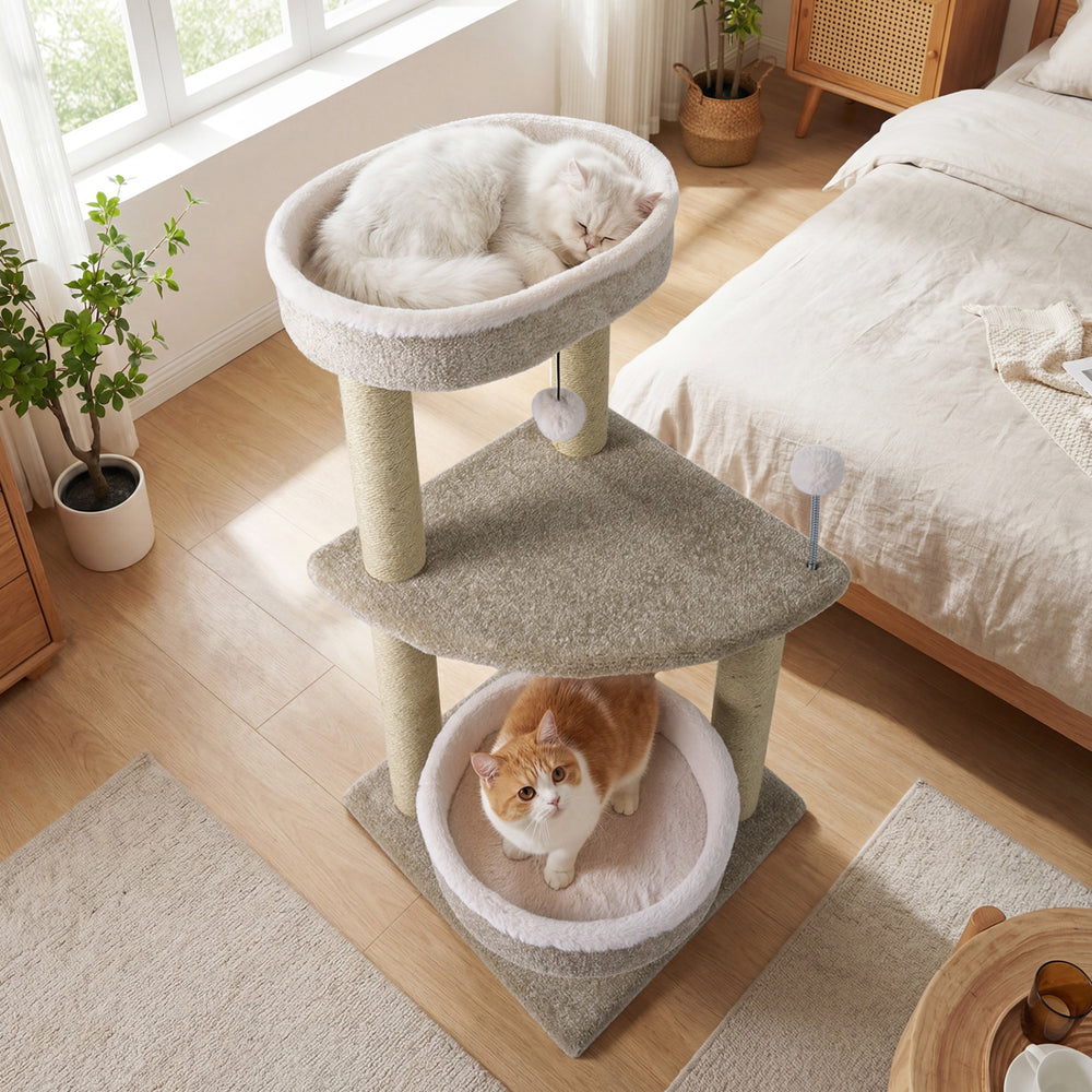 Multi-level 36" carpeted cat tree with plush perches, scratching posts, and interactive toys for playful lounging.
