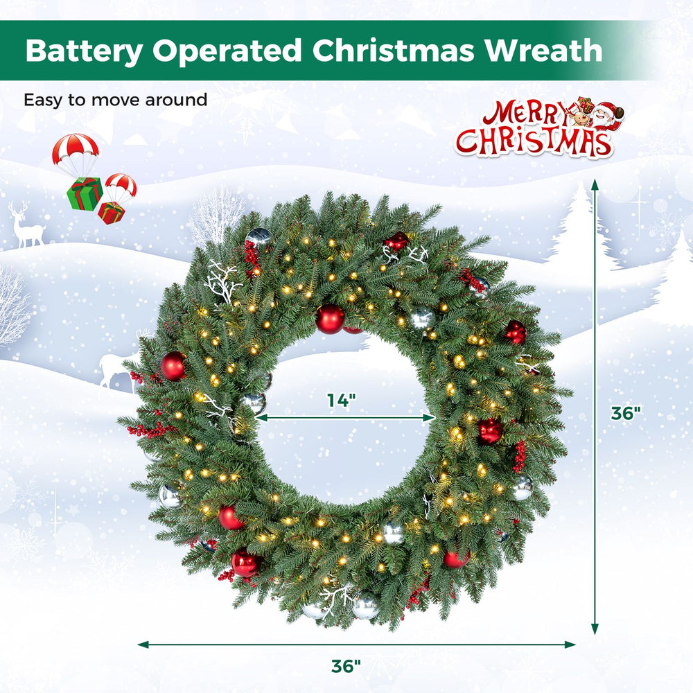 36-inch pre-lit Christmas wreath featuring 100 warm white LED lights, red berries, and a stable metal frame for festive decor.