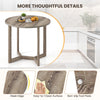 Round 36-inch grey wood dining table with wing-shaped pedestal base, featuring a smooth surface and non-slip foot pads.
