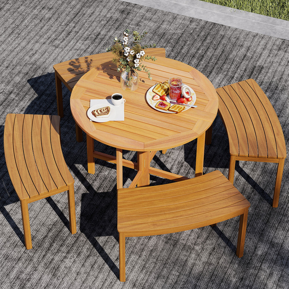 Round 36-inch outdoor folding dining table made of acacia wood, featuring a slatted tabletop, perfect for backyard.