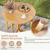 36-inch outdoor folding round dining table made of acacia wood, featuring a slatted tabletop for backyard gatherings.