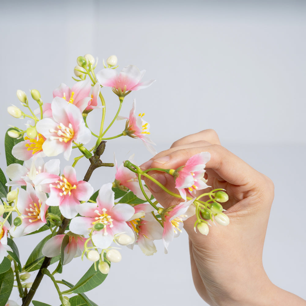 Artificial impatiens tree with pink silk flowers and mini fruits, perfect for enhancing living rooms or cafes.