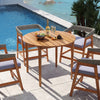 Round 36-inch acacia wood outdoor dining table for 4, featuring slatted design and adjustable foot pads, perfect for.