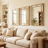 Gold wall mirror with beaded frame, 36 x 24 inches, adds timeless elegance to living rooms and entryways.