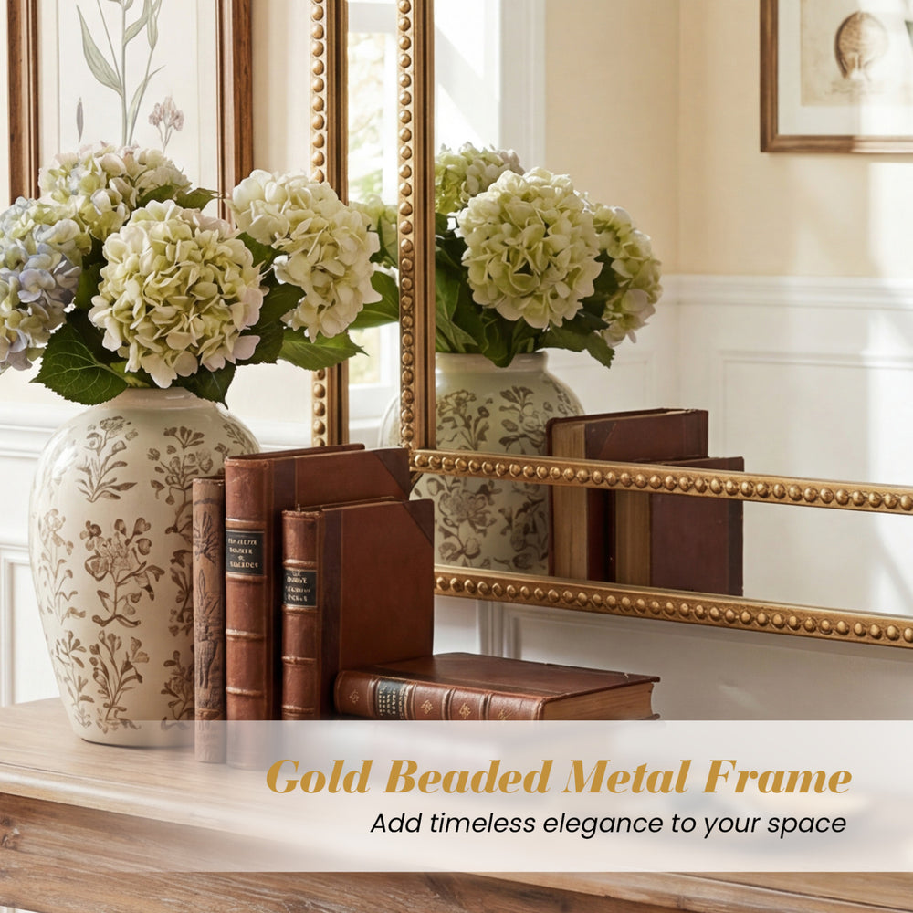 Gold beaded metal frame wall mirror, 36 x 24 inches, adds timeless elegance to living rooms and entryways.