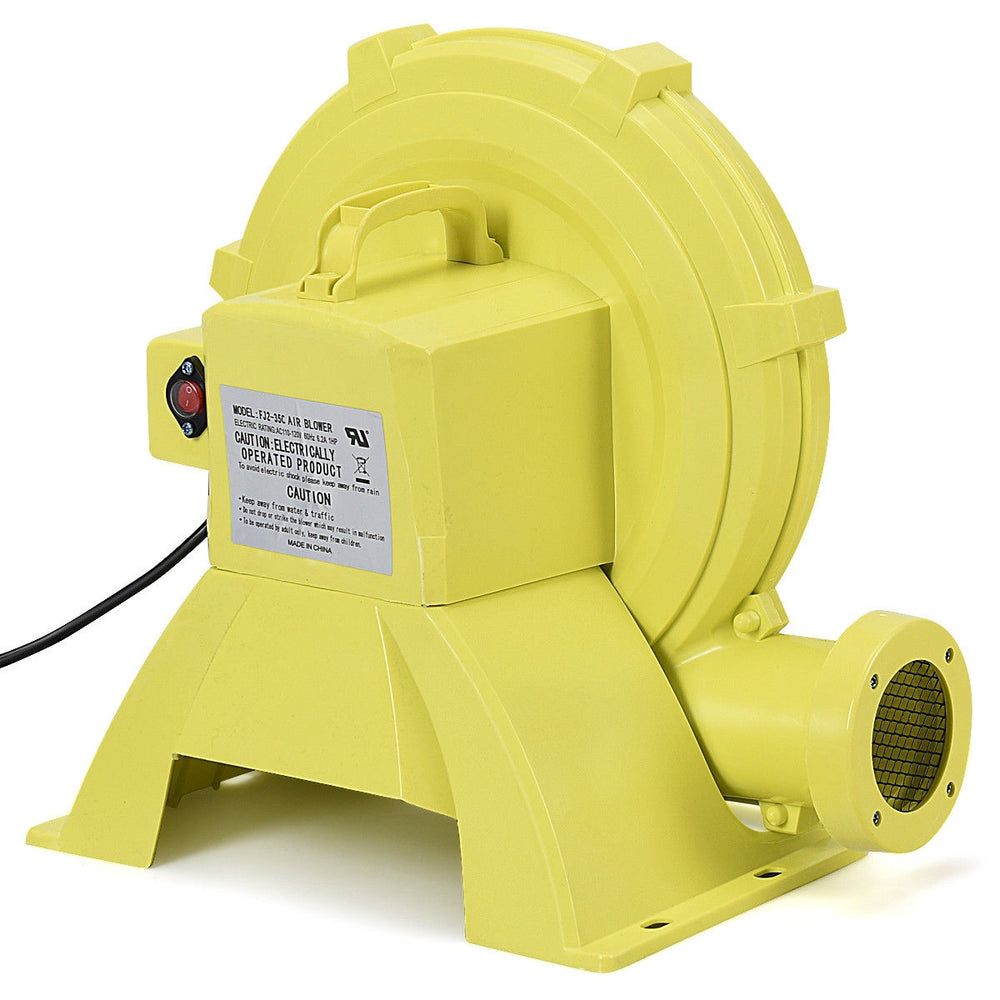Yellow 735 W air blower pump fan with handle, designed for inflatable bounce houses, featuring a protective wire mesh.