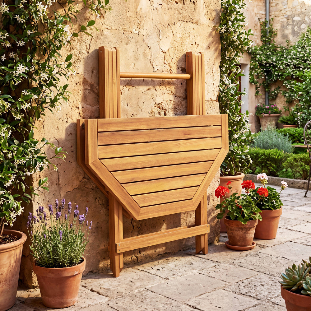 Folding octagonal acacia wood dining table for 4 with slatted tabletop, ideal for outdoor patios and gardens.