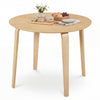 Round dining table with rubber wood legs, spacious for 4, designed for small spaces, perfect for kitchens and dining.