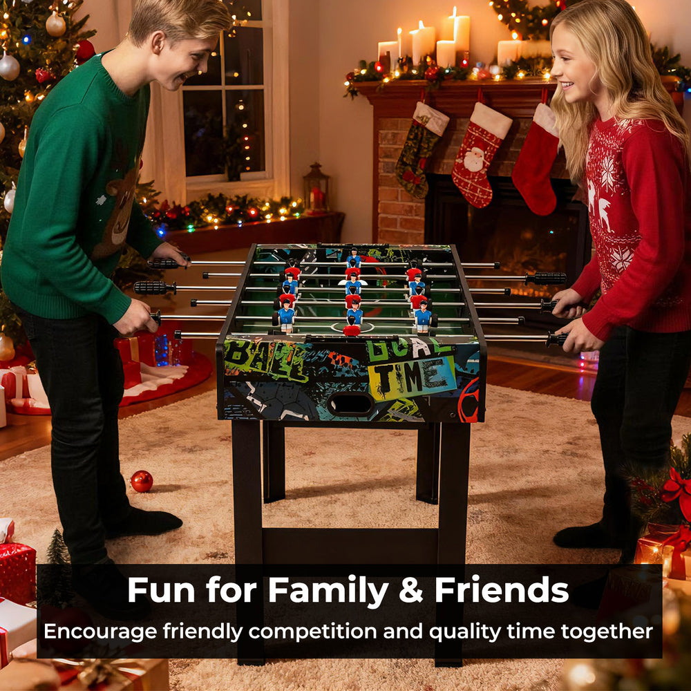 Mini foosball table with vibrant graphics, detachable legs, and smooth metal rods for tabletop fun with family and.