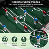 Mini foosball table with realistic game pieces, featuring 7 blue and 7 red players for tabletop soccer fun.