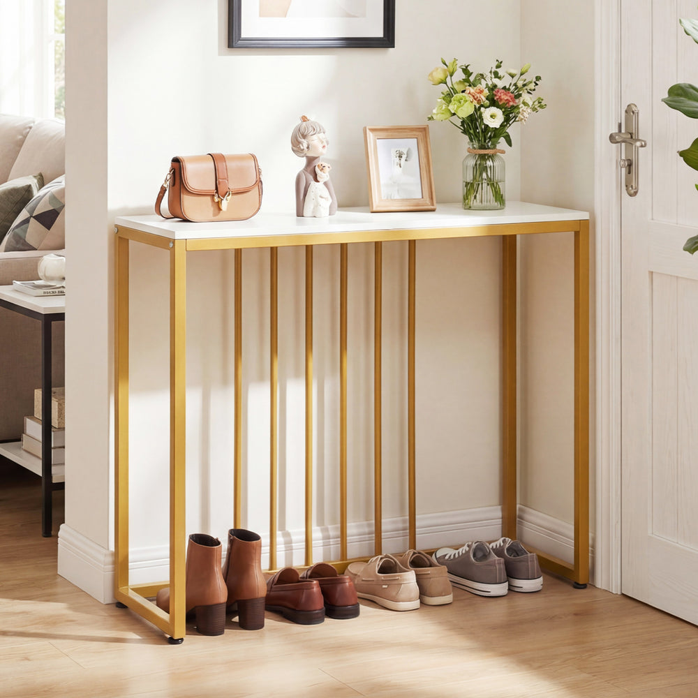 Modern console table with white top and gold metal frame, featuring built-in charging station for entryway organization.