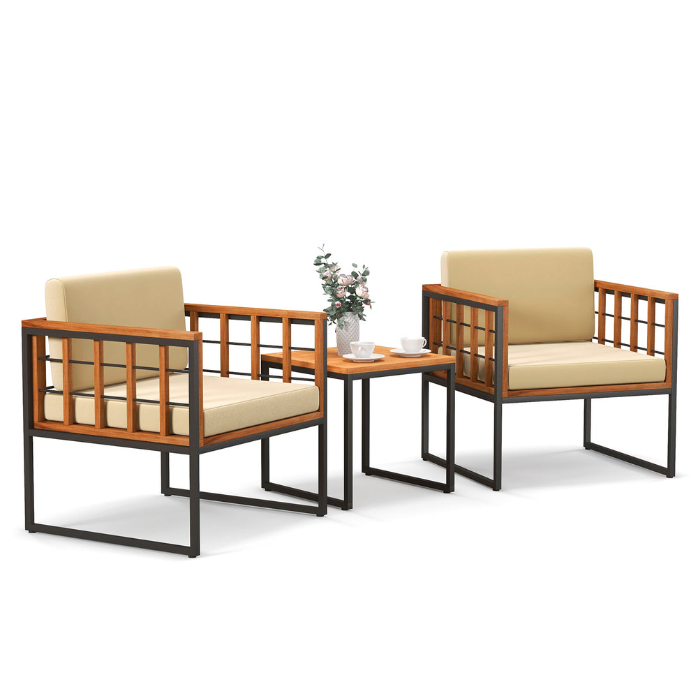 Two acacia wood patio chairs with beige cushions and a matching table, perfect for outdoor relaxation.