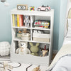 3-tier children's bookcase in white with cubbies and a bottom bin, ideal for organizing toys and books in a bedroom.